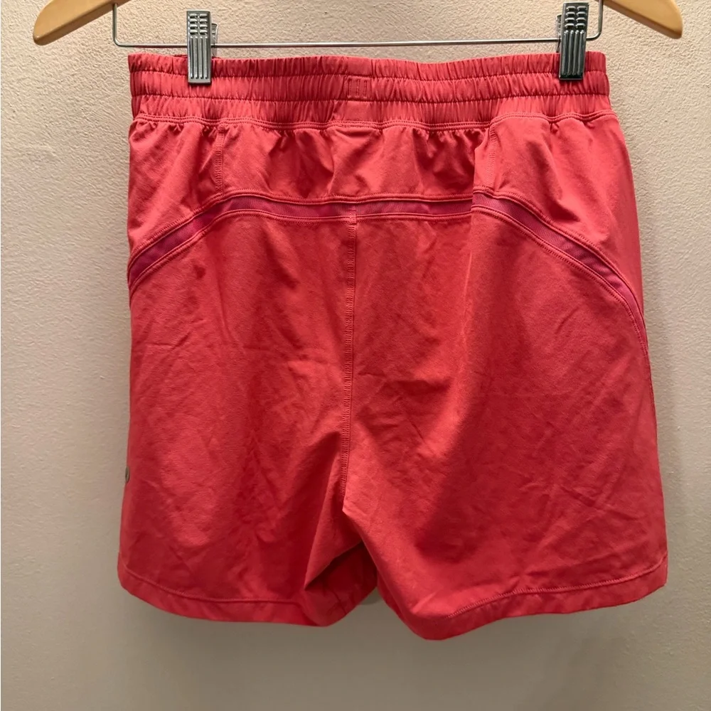 Lululemon Pace Breaker Shorts Coral Pink Mesh Vent Zipper Pockets Size S LM7BC0S